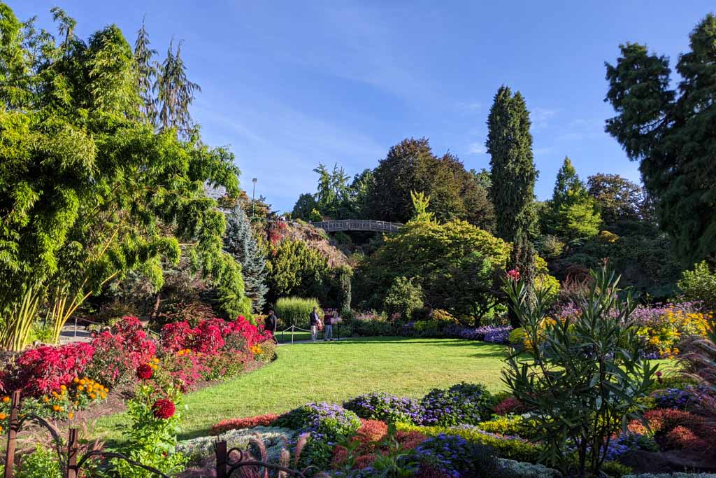 Queen Elizabeth Park in Vancouver in the summer with the flowers blossomed and plants bright and green