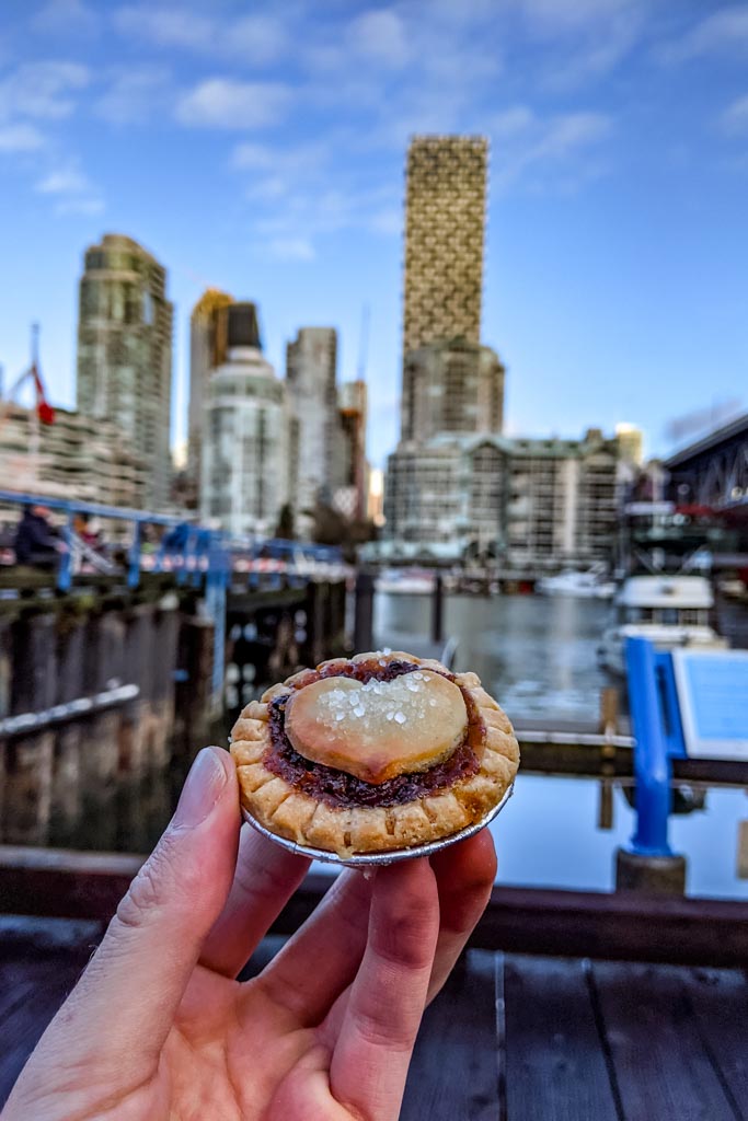 Granville Island views of Vancouver with a mince pie in Dans hand