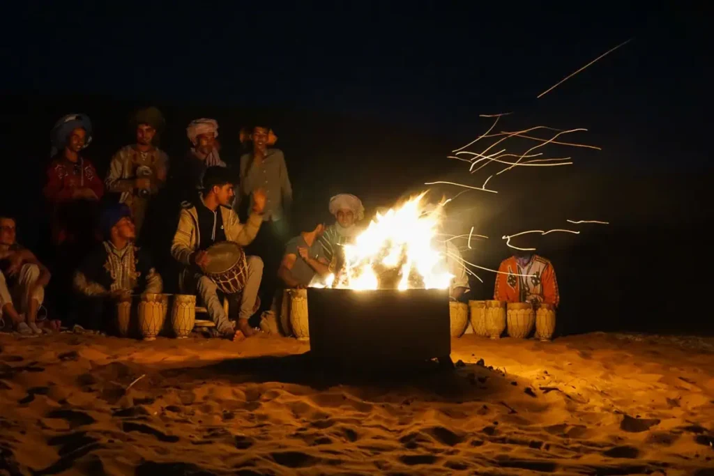 Camping in the Sahara Desert around the fire