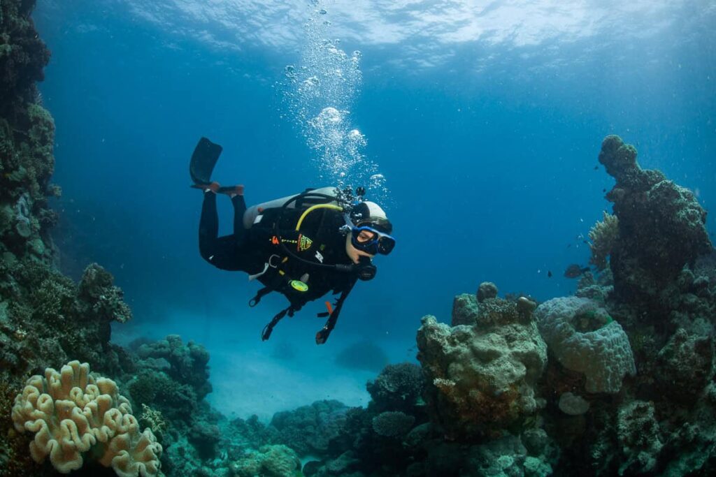 Amy scuba diving for the first time in the Great Barrier Reef,  Australia